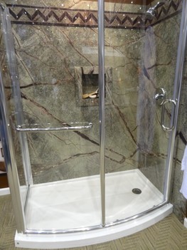 Curved glass enclosure acrylic base and Sentrel Waterproof Wall Surrounds